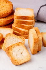 mini toasts on a white wooden table