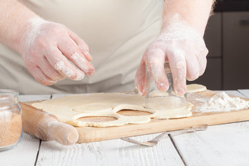 Making festive gingerbread dough on a baking sheet