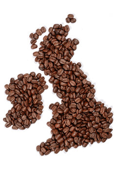 Whole bean coffee. The contour of Great Britain is made of coffee beans, isolated on white background.