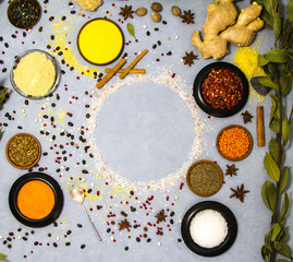 set of spices and herbs on blue background