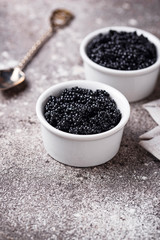Sturgeon black caviar in bowls