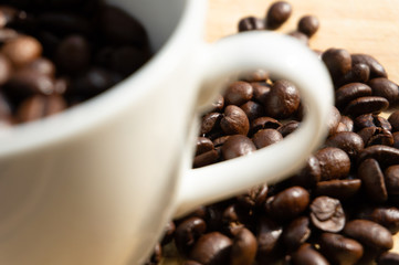 coffee beans in a white mug