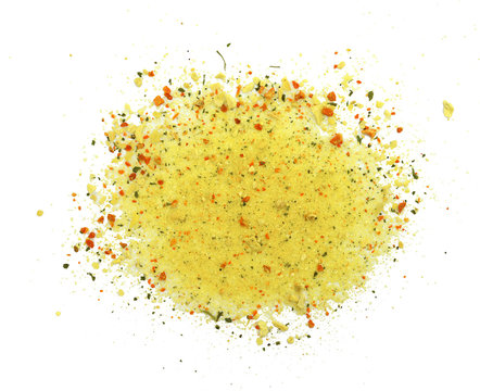 Grounded spice ingredient of dry mix vegetables isolated on white. Vegeta spices. A pile of a yellow spice mix.  Spices consist dried dehydrated vegetables carrot paprika onion garlic parsnip parsley 