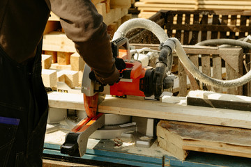 Work sawing boards. Sawmill. wood harvesting process