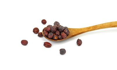 Dried medicinal herbs raw materials isolated on white. Fruit of Crataegus commonly called hawthorn,...