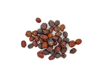 Dried medicinal herbs raw materials isolated on white. Fruit of Crataegus commonly called hawthorn, thornapple, May-tree, whitethorn, or hawberry. Cure for the heart.