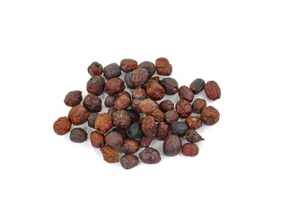 Dried medicinal herbs raw materials isolated on white. Fruit of Crataegus commonly called hawthorn, thornapple, May-tree, whitethorn, or hawberry. Cure for the heart.