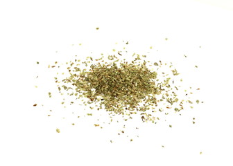 Pile of dried oregano isolated on white. Pile of dried oregano leaves on a white background. Spice for pizza. Pizza ingredient.