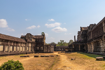 Fototapeta na wymiar Buildings on territory of ancient temple complex Angkor Wat, Siem Reap, Cambodia