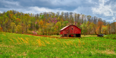 Red Barn in a Hay Field