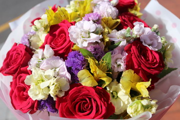 February, a bouquet of flowers to celebrate graduation on a clear day. 