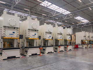 Machines for the production of metal automotive parts