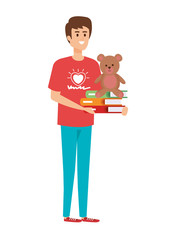 man volunteer with books and bear teddy