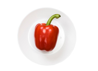 single red bell pepper isolated on white background