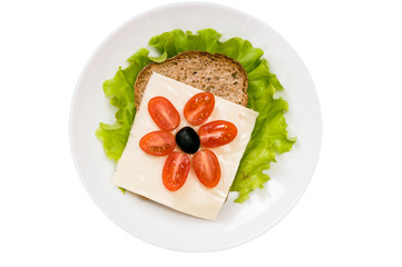 sandwich with vegetables and cheese on a white plate isolated on white background