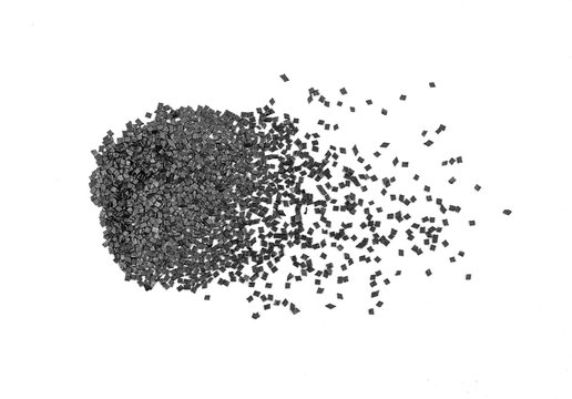 Gunpowder for a military or hunting rifle. Pile gunpowder, black powder isolated on white background.