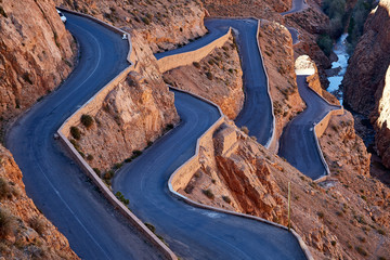 twisting mountain road deep valley