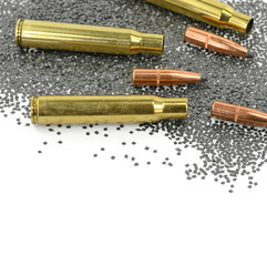A rifle bullet with gun powder isolated