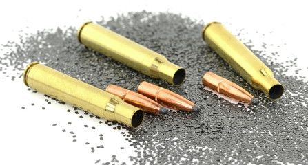 A rifle bullet with gun powder isolated