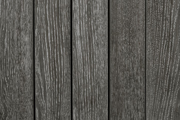 Dark gray wooden board texture background. Grey textured background. Abstract background, pattern. Rough textured surface.