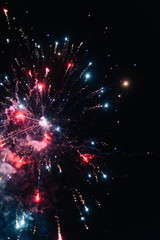 Fototapeta na wymiar background texture fireworks on the black sky