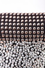 Fabric with sequins and sequins of bright colors. Fashion glitter fabric, sequins. Shiny surface