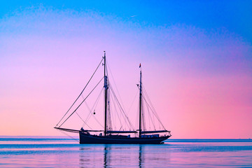 sailing ship at sunset