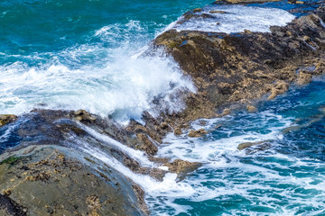 North America, Oregon, Pacific Ocean, Coos County, Cape Arago State Park. Rugged Coastline. Scenic Shores. Wave breaking on rocks.