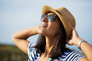 Young indian woman relaxing in the countryside