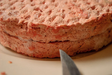 Frozen Burgers with a Knife