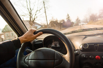 driving a car on a hot summer sunny day