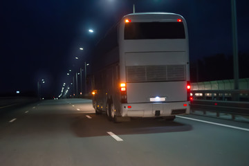 Bus Moves Over Night Highway