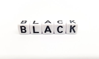 black word built with white cubes and black letters on white background