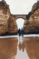 couple walking on the beach - 262631842