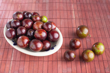 fruits of jaboticaba in bowl on the table