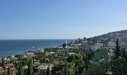 Fototapeta na wymiar View of the city of Yalta from the cable car cabin