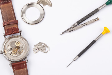Repairing the old mechanical watches. parts of automatic wristwatch