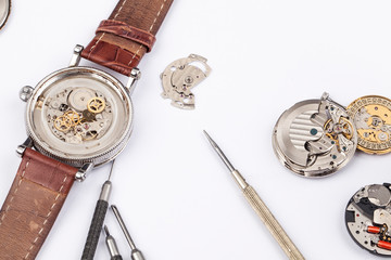 Repair of mechanical watches with metal tools