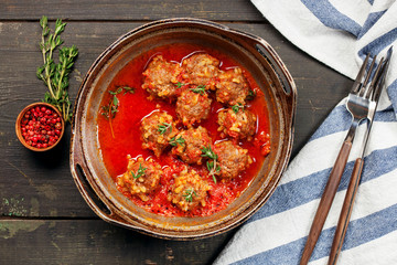 Meatballs with rise in tomato sauce
