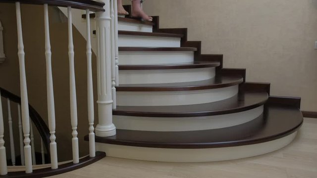 Climbing the stairs on crutches with a broken leg in the Ilizarov's external fixator