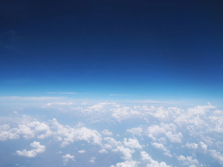 Fototapeta na wymiar Blue clear sky view above white clouds