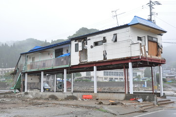 Fototapeta na wymiar Seriously Damaged City by Tsunami Disaster in Japan 2011