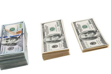 Bundle of US 100 dollars bank notes isolated on white background.