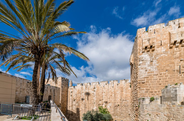 Naklejka premium Ancient fortified wall in old Jerusalem holy city, Israel