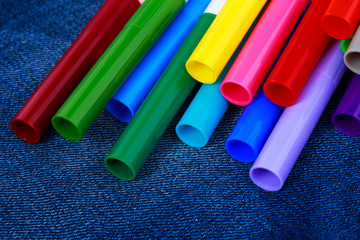 colored markers on jeans