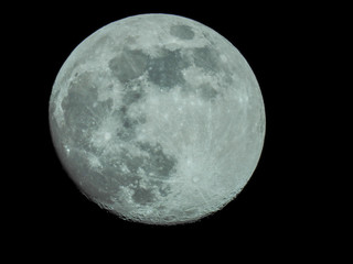 almost full moon in the night sky