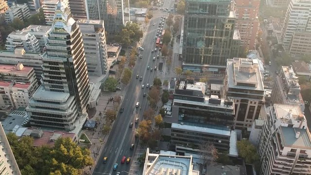 Aerial Drone Shot of street flying across concrete jungle, Santiago Chile