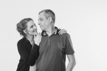 couple in love hugs on white background. man and woman smiling. Valentine's day