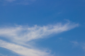 Blue sky and soft white clouds background
