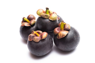 Group of mangosteen isolated on white background. Mangosteen is a queen of fruit in Thailand and asia fruit have a sweet. Fresh dark mangosteen background. Mangosteen is a popular fruit in Thailand.